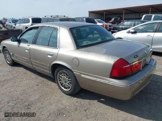 2002 Mercury Grand Marquis GS with VIN 2MEFM74WX2X659583, listed as a IAAI auction lot 41792673 with 183,449 mi miles. Bid and sale history available at carsss.com. Image 3.