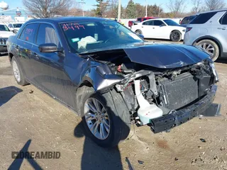 2018 Chrysler 300 Touring with VIN 2C3CCAAG5JH281946, listed as a IAAI auction lot 41723499 with 73,358 mi miles and . Bid and sale history available at DreamBid. Image 1.