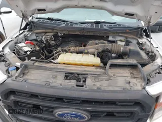 2022 Ford F-150 XL with VIN 1FTMF1CBXNKE23893, listed as a IAAI auction lot 42605938 with 120,591 mi miles and . Bid and sale history available at DreamBid. Image 10.