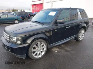 2007 Land Rover Range Rover Sport SC z VIN SALSH23497A111915, wystawiony jako IAAI lot #41491636 z przebiegiem 153 924 mil mil oraz . Historia ofert i sprzedaży dostępna na DreamBid. Obrazek 2.