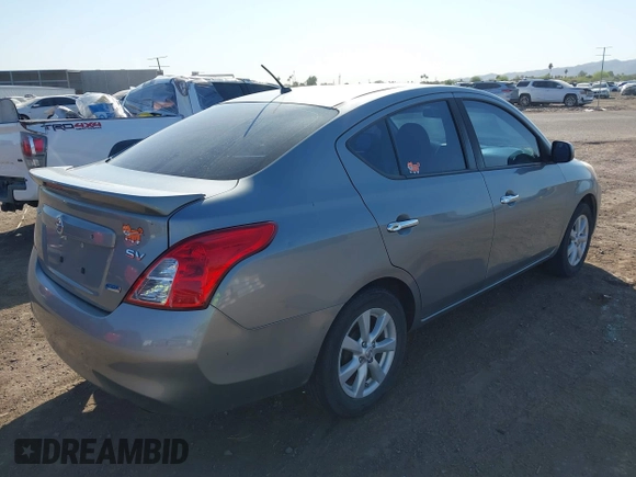2014 Nissan Versa SV with VIN 3N1CN7AP0EL841381, listed as a IAAI auction lot 42016744 with 137,699 mi miles. Bid and sale history available at carsss.com. Image 4.