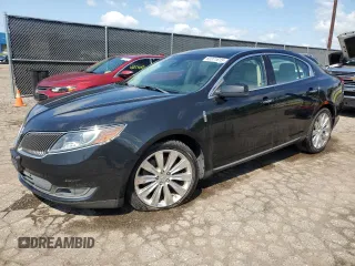 2013 Lincoln MKS EcoBoost with VIN 1LNHL9FTXDG601232, listed as a Copart auction lot 60371615 with 83,421 mi miles and Clean title. Bid and sale history available at DreamBid. Image 1.