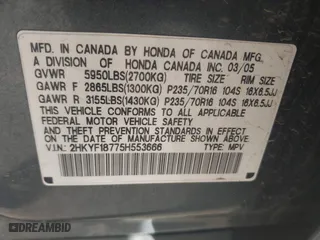 2005 Honda Pilot EX-L with NAVI with VIN 2HKYF18775H553666, listed as a IAAI auction lot 41858179 with 241,011 mi miles. Bid and sale history available at carsss.com. Image 9.