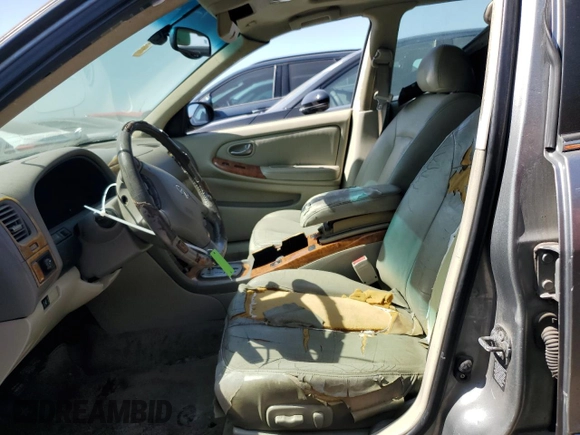 2003 Infiniti I35 Luxury with VIN JNKDA31A13T115988, listed as a Copart auction lot 51068265 with 240,695 mi miles and Salvage Title. Bid and sale history available at DreamBid. Image 7.