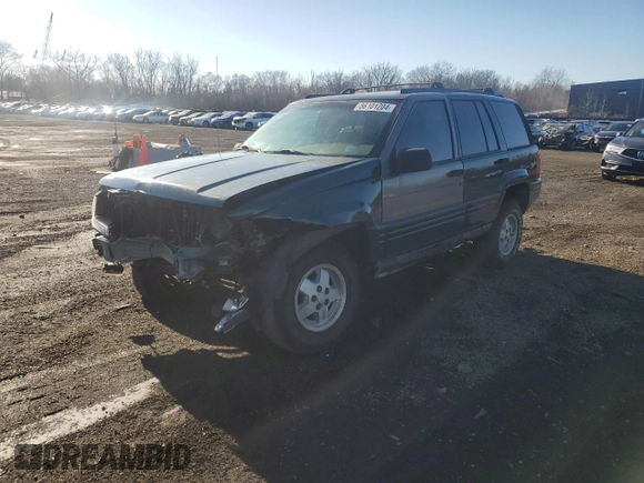 1998 Jeep Grand Cherokee Laredo with VIN 1J4GZ48S4WC239246, listed as a Copart auction lot 86101204 with 0 mi miles and Salvage Title. Bid and sale history available at carsss.com. Image 1.