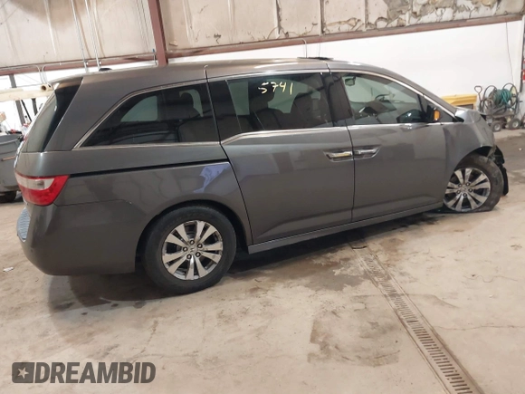 2011 Honda Odyssey Touring Elite with VIN 5FNRL5H96BB030946, listed as a IAAI auction lot 41465741 with 122,678 mi miles and . Bid and sale history available at DreamBid. Image 4.