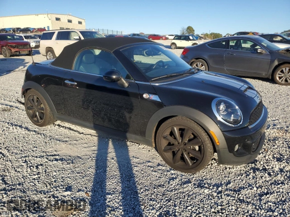 2012 MINI Roadster S z VIN WMWSY3C51CT565240, wystawiony jako Copart lot #83651954 z przebiegiem 172 954 mil mil oraz Szkody całkowita. Historia ofert i sprzedaży dostępna na DreamBid. Obrazek 4.