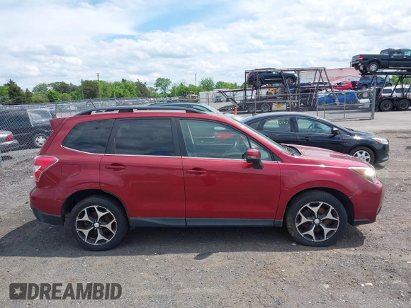 2014 Subaru Forester XT Touring with VIN JF2SJGMC1EH500150, listed as a IAAI auction lot 42201409 with 106,728 mi miles and . Bid and sale history available at DreamBid. Image 13.