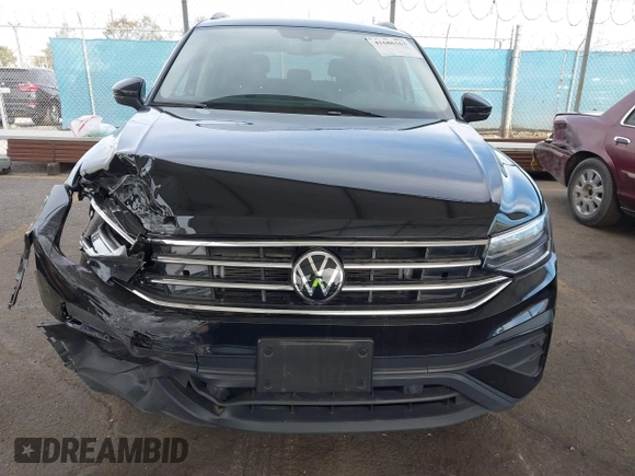 2023 Volkswagen Tiguan S with VIN 3VVRB7AX7PM109974, listed as a IAAI auction lot 41686163 with 42,284 mi miles and . Bid and sale history available at DreamBid. Image 12.