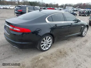 2013 Jaguar XF V6 SC with VIN SAJWJ0EF1D8S81898, listed as a IAAI auction lot 41951634 with 113,697 mi miles. Bid and sale history available at carsss.com. Image 4.