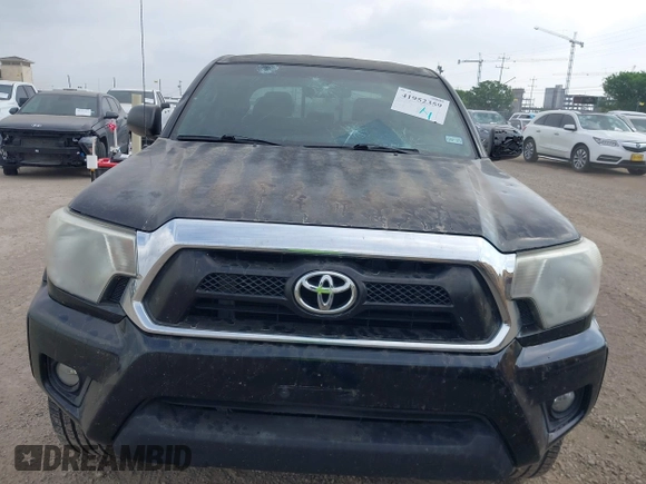 2014 Toyota Tacoma PreRunner with VIN 3TMJU4GN9EM157662, listed as a IAAI auction lot 41952359 with 109,002 mi miles and . Bid and sale history available at DreamBid. Image 6.