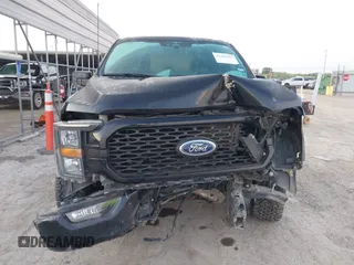 2023 Ford F-150 XL z VIN 1FTEW1CP0PKE36512, wystawiony jako IAAI lot #42260269 z przebiegiem 34 312 mil mil oraz . Historia ofert i sprzedaży dostępna na DreamBid. Obrazek 12.
