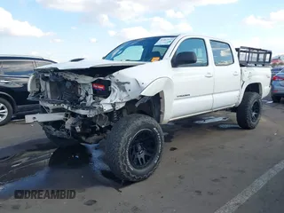 2007 Toyota Tacoma PreRunner z VIN 3TMJU62N87M029323, wystawiony jako IAAI lot #41462575 z przebiegiem 211 104 mil mil oraz . Historia ofert i sprzedaży dostępna na DreamBid. Obrazek 6.