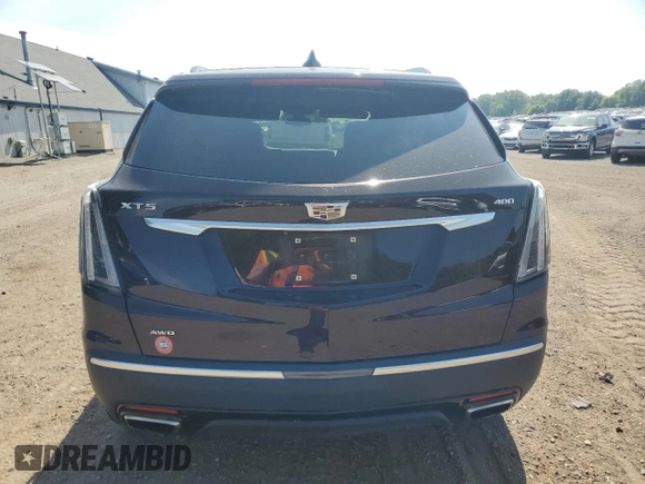2021 Cadillac XT5 AWD Sport with VIN 1GYKNGRS8MZ152739, listed as a Copart auction lot 60675705 with 51,669 mi miles and Salvage title. Bid and sale history available at DreamBid. Image 6.
