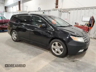 2011 Honda Odyssey Touring with VIN 5FNRL5H98BB027997, listed as a Copart auction lot 63239175 with 282,123 mi miles and Clean title. Bid and sale history available at DreamBid. Image 4.