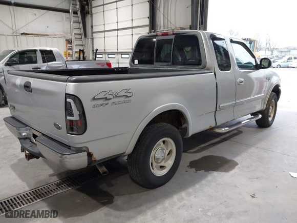 2000 Ford F-150 XL with VIN 1FTRX18L4YNB66317, listed as a IAAI auction lot 41932247 with 1 mi miles. Bid and sale history available at carsss.com. Image 3.