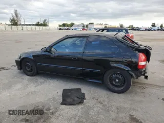 2000 Honda Civic DX z VIN 2HGEJ6445YH110148, wystawiony jako Copart lot #83769104 z przebiegiem 183 095 mil mil oraz Szkoda całkowita • Salvage title. Historia ofert i sprzedaży dostępna na DreamBid. Obrazek 2.