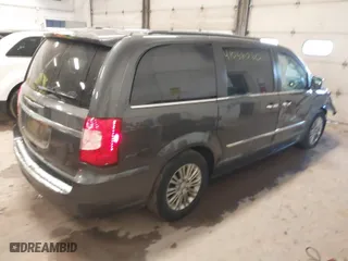2016 Chrysler Town & Country Touring-L Anniversary Edition with VIN 2C4RC1CG5GR166074, listed as a IAAI auction lot 41036060 with 72,885 mi miles. Bid and sale history available at carsss.com. Image 4.