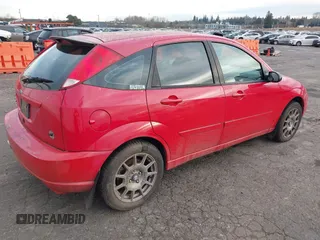 2004 Ford Focus with VIN 3FAHP30554R112736, listed as a IAAI auction lot 41424365 with 212,393 mi miles and . Bid and sale history available at DreamBid. Image 4.