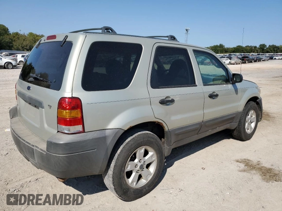 2006 Ford Escape XLT with VIN 1FMCU03116KA69312, listed as a Copart auction lot 70773514 with 164,079 mi miles and Salvage Title. Bid and sale history available at carsss.com. Image 3.