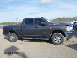 2021 Ram 2500 Big Horn with VIN 3C6UR5DL8MG653404, listed as a IAAI auction lot 42029002 with 150,112 mi miles and . Bid and sale history available at DreamBid. Image 13.