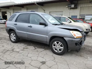 2005 Kia Sportage LX with VIN KNDJF723057062113, listed as a Copart auction lot 66630164 with 129,715 mi miles and Salvage Title. Bid and sale history available at carsss.com. Image 4.