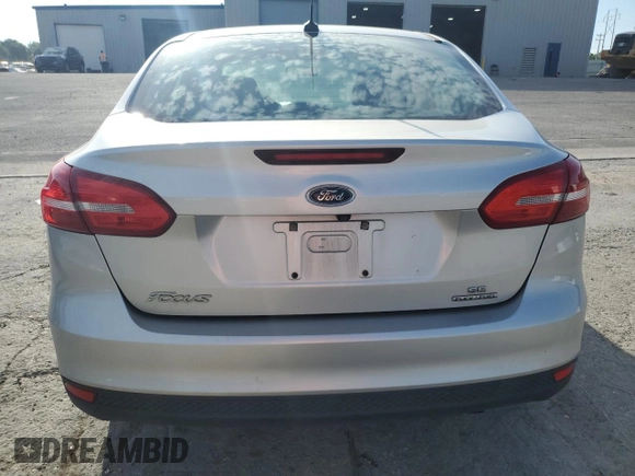 2015 Ford Focus SE with VIN 1FADP3F28FL234097, listed as a Copart auction lot 62660245 with 120,100 mi miles and Salvage title. Bid and sale history available at DreamBid. Image 6.