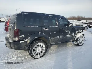 2011 Dodge Nitro Heat with VIN 1D4PU4GX2BW501410, listed as a Copart auction lot 41743945 with 174,235 mi miles and Clean Title. Bid and sale history available at DreamBid. Image 3.