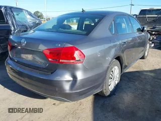 2015 Volkswagen Passat 1.8T Wolfsburg Ed with VIN 1VWAT7A3XFC010262, listed as a IAAI auction lot 41860210 with 99,775 mi miles. Bid and sale history available at carsss.com. Image 4.