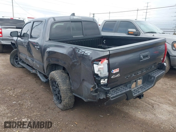 2023 Toyota Tacoma SR with VIN 3TYCZ5AN5PT138770, listed as a IAAI auction lot 41461423 with 19,785 mi miles and . Bid and sale history available at DreamBid. Image 3.