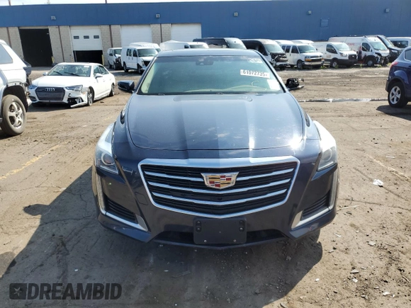 2015 Cadillac CTS Luxury AWD with VIN 1G6AX5SX7F0125516, listed as a Copart auction lot 61072735 with 111,448 mi miles and Clean title. Bid and sale history available at DreamBid. Image 5.