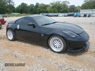 2003 Nissan 350Z Touring z VIN JN1AZ34E53T005833, wystawiony jako Copart lot #55437345 z przebiegiem 144 141 mil mil oraz Szkoda całkowita • Salvage title. Historia ofert i sprzedaży dostępna na DreamBid. Obrazek 4.