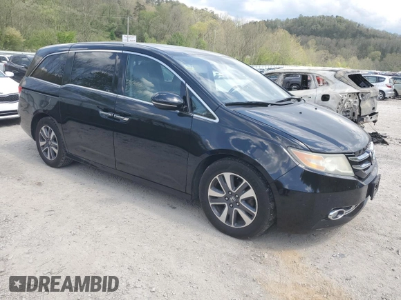 2016 Honda Odyssey Touring Elite with VIN 5FNRL5H97GB038917, listed as a Copart auction lot 54479375 with 165,432 mi miles and Salvage Title. Bid and sale history available at DreamBid. Image 4.