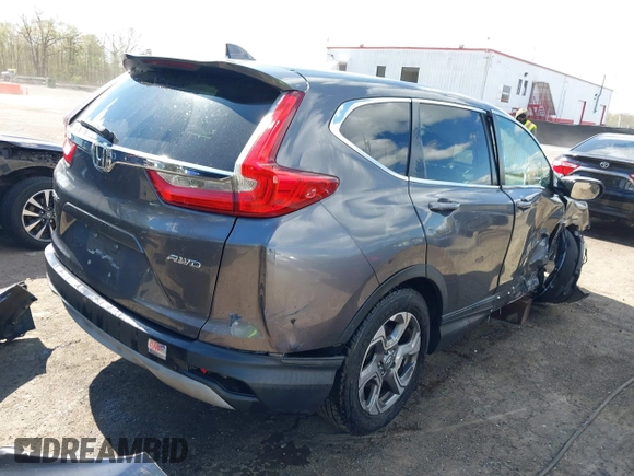 2017 Honda CR-V EX with VIN 2HKRW2H5XHH678674, listed as a IAAI auction lot 42039505 with 124,891 mi miles. Bid and sale history available at carsss.com. Image 4.