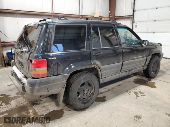 1998 Jeep Grand Cherokee Laredo with VIN 1J4GZ58Y9WC122076, listed as a Copart auction lot 84221784 with 387,353 mi miles and Salvage Title. Bid and sale history available at carsss.com. Image 3.