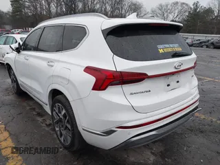 2023 Hyundai Santa Fe Calligraphy with VIN 5NMS54AL7PH522550, listed as a IAAI auction lot 41554597 with 56,208 mi miles. Bid and sale history available at carsss.com. Image 3.