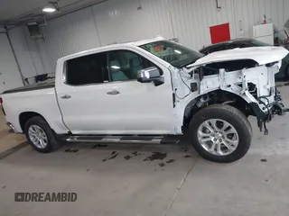 2023 Chevrolet Silverado 1500 LTZ with VIN 1GCUDGEDXPZ100414, listed as a IAAI auction lot 40005559 with 40,000 mi miles and . Bid and sale history available at DreamBid. Image 14.