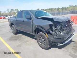 2024 Ford Ranger XLT with VIN 1FTER4GHXRLE46487, listed as a IAAI auction lot 41899384 with 5,570 mi miles. Bid and sale history available at carsss.com. Image 1.