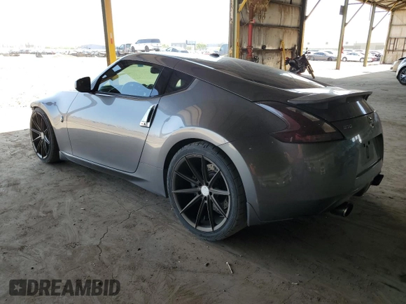 2012 Nissan 370Z Touring with VIN JN1AZ4EH9CM564312, listed as a Copart auction lot 52127525 with 134,465 mi miles and Salvage Title. Bid and sale history available at carsss.com. Image 2.