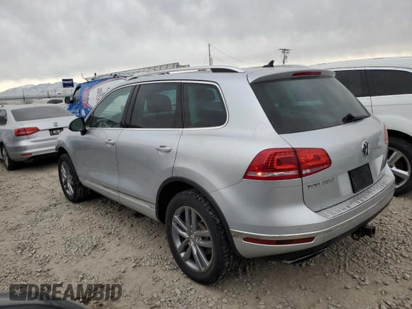 2016 Volkswagen Touareg Sport with VIN WVGEF9BP4GD010645, listed as a Copart auction lot 43271015 with 52,803 mi miles and Salvage Title. Bid and sale history available at DreamBid. Image 2.