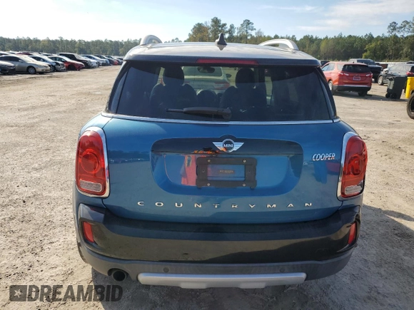 2018 MINI Countryman Cooper with VIN WMZYV5C38J3E04688, listed as a Copart auction lot 79697214 with 65,239 mi miles and Salvage Title. Bid and sale history available at carsss.com. Image 6.