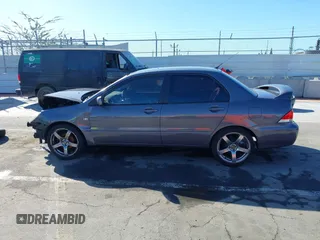 2005 Mitsubishi Lancer ES with VIN JA3AJ26E25U017526, listed as a IAAI auction lot 41680488 with 166,175 mi miles. Bid and sale history available at carsss.com. Image 15.