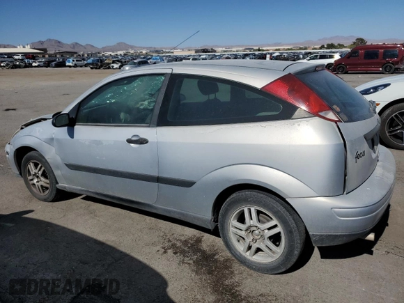 2000 Ford Focus ZX3 with VIN 3FAFP3132YR183435, listed as a Copart auction lot 60214034 with Not provided miles and Salvage title. Bid and sale history available at DreamBid. Image 2.