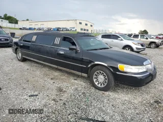 2000 Lincoln Town Car Executive с VIN 1L1FM81W8YY771526, выставлен на аукционе Copart как лот 65654725 с пробегом 51 048 миль миль и Чистый • Clean title. История ставок и продаж доступна на DreamBid. Изображение 4.