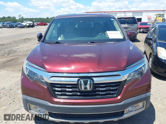 2019 Honda Ridgeline RTL-E with VIN 5FPYK3F72KB031085, listed as a IAAI auction lot 42236249 with 73,612 mi miles and . Bid and sale history available at DreamBid. Image 13.