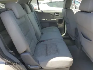 2006 Ford Freestyle SE z VIN 1FMZK01136GA36883, wystawiony jako Copart lot #56223985 z przebiegiem 156 885 mil mil oraz Szkody całkowita. Historia ofert i sprzedaży dostępna na DreamBid. Obrazek 11.