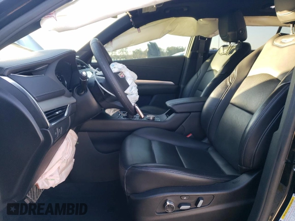 2020 Cadillac XT4 FWD Premium Luxury z VIN 1GYFZCR44LF056476, wystawiony jako Copart lot #43559495 z przebiegiem 51 076 mil mil oraz Szkody całkowita. Historia ofert i sprzedaży dostępna na DreamBid. Obrazek 7.