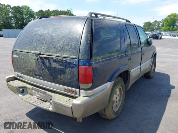 2001 GMC Jimmy SLE z VIN 1GKDT13W612136433, wystawiony jako IAAI lot #42336277 z przebiegiem Nie podano mil oraz . Historia ofert i sprzedaży dostępna na DreamBid. Obrazek 4.