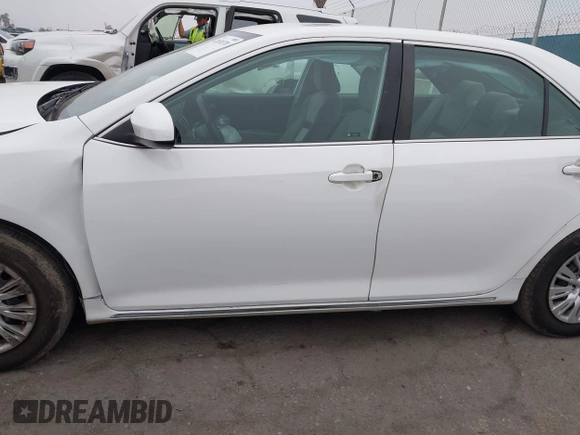 2014 Toyota Camry L with VIN 4T4BF1FK1ER416128, listed as a IAAI auction lot 42030370 with 79,475 mi miles and . Bid and sale history available at DreamBid. Image 14.