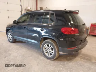 2014 Volkswagen Tiguan SE z VIN WVGAV3AX9EW614094, wystawiony jako IAAI lot #42350601 z przebiegiem 128 996 mil mil oraz . Historia ofert i sprzedaży dostępna na DreamBid. Obrazek 3.